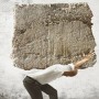 man_carrying_huge_rock580