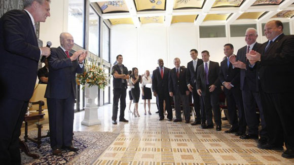 A Congressional delegation singing happy birthday to Israeli president Shimon Peres.