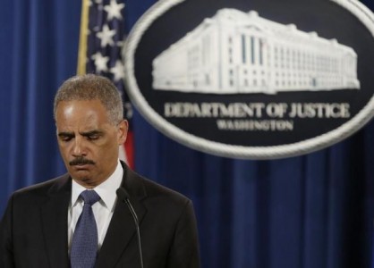 United States Attorney General Holder holds a news conference announcing updates on investigation of Brown shooting in Ferguson Missouri, in Washington