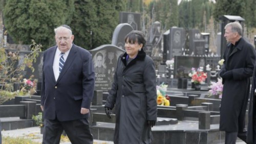 U.S. Commerce Secretary Penny Pritzker visits a Jewish cemetery in the Ukrainian town of Bila Tserkva, where some of her distant relatives may be buried in Ukraine, Tuesday, Oct. 27, 2015. (AP Photo/Efrem Lukatsky)