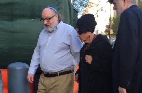 In this still image from video provided by WCBS-TV, convicted spy Jonathan Pollard, left, arrives at a federal courthouse in New York with his wife, Esther, to check in at a probation office just hours after he was released from prison on Friday, Nov. 20, 2015. Pollard's release was the culmination of an extraordinary espionage case that complicated American-Israeli relations for 30 years and became a periodic bargaining chip between two allies. (Ilana Gold/WCBS-TV via AP)
